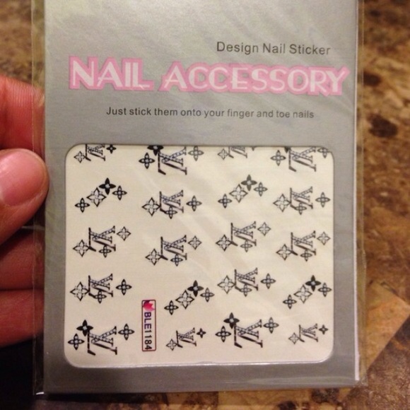 2 nail stickers and one set of nail tips