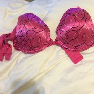 Hot pink bra with black hearts