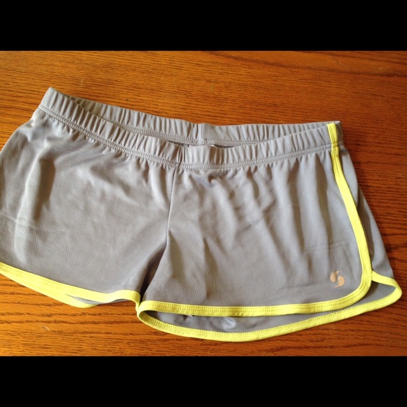 grey and yellow athletic shorts