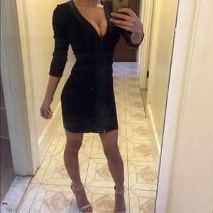 Body hugging zip up black dress