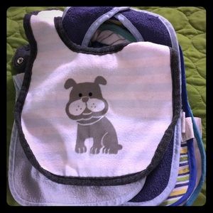 Baby receiving blankets and bibs bundled