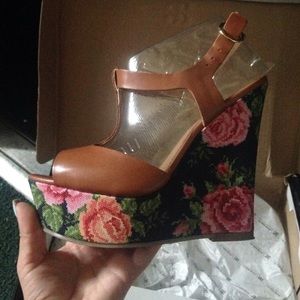 Brown and flowered wedges.