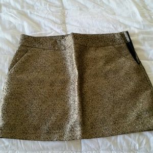 Gold and black mini skirt