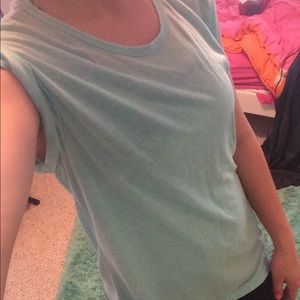 Sleeveless t shirt. Light blue