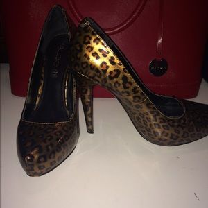 Aldo Leopard Pumps 7.5