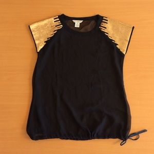 Sheer black top with rose gold sequin sleeves