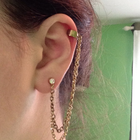 Diamond earrings with a gold chain