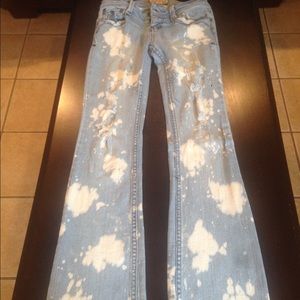 Distressed stone washed jeans