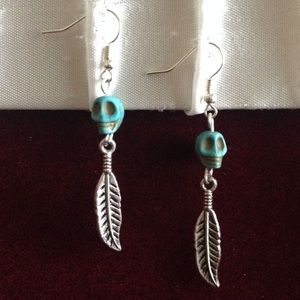 Skull and feather earrings