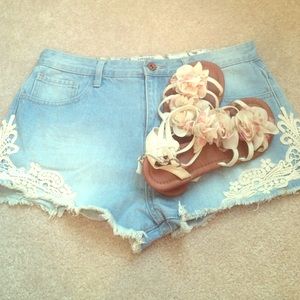 High waisted lace detail light wash jean shorts