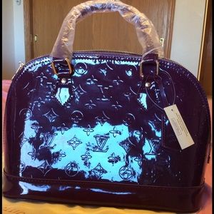 NWT Cute Plum/purple Alma GM Vernis