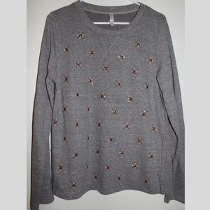 Grey sweater w/ jewel front designs.