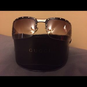 Gucci monogram shield sunglasses
