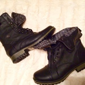 Black combat boots with grey interior