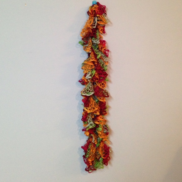 Multi-colored scarf. About 6 feet long.