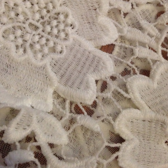 A white see-through pullover. - Picture 2 of 2