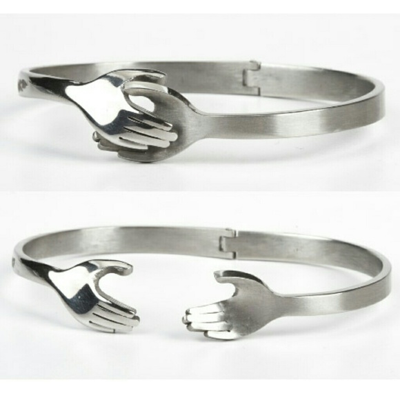Clasped hands bracelet