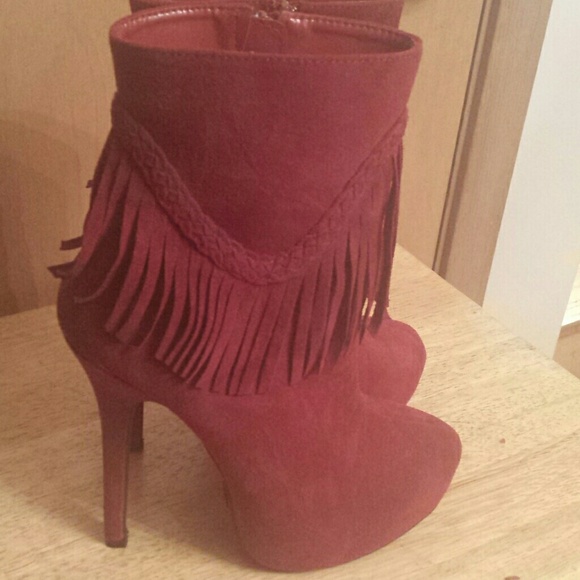 Red fringe ankle boots