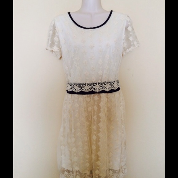 Lace dress with black trim