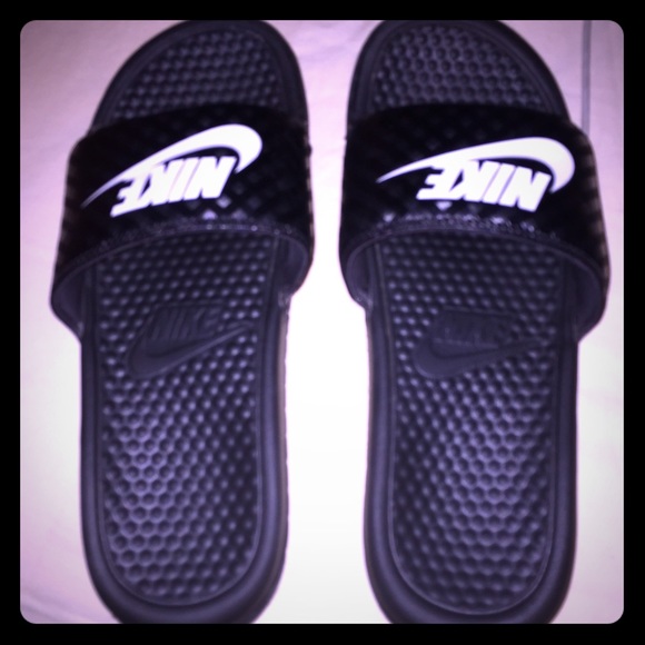 Worn one time Nike slip ons!