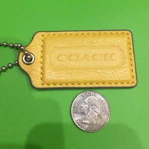 Coach mustard yellow tag