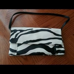 Zebra print handbag.