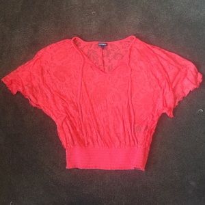 Orange spring top with bat sleeves