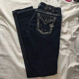 Miss Me straight leg dark wash jeans.