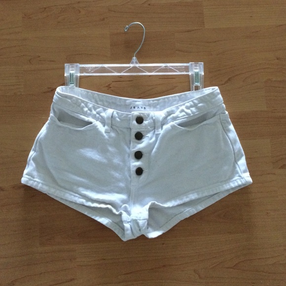 White mid-waisted American Apparel shorts.