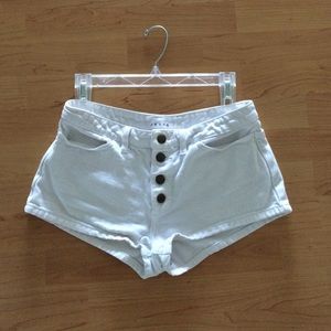 White mid-waisted American Apparel shorts.