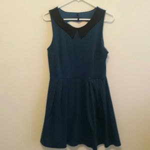 Fit n' flair, with heart cut out of back dress