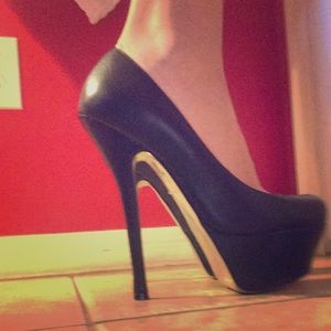 Bebe Black leather pumps