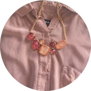 Light peach and raspberry colored necklace