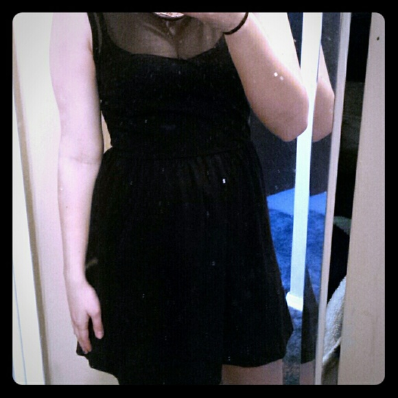 Black skater dress with mesh top.