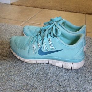 Lightly worn light blue nike shoes
