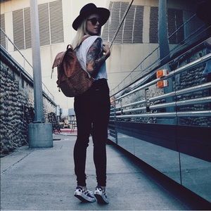 Gold studded black backpack