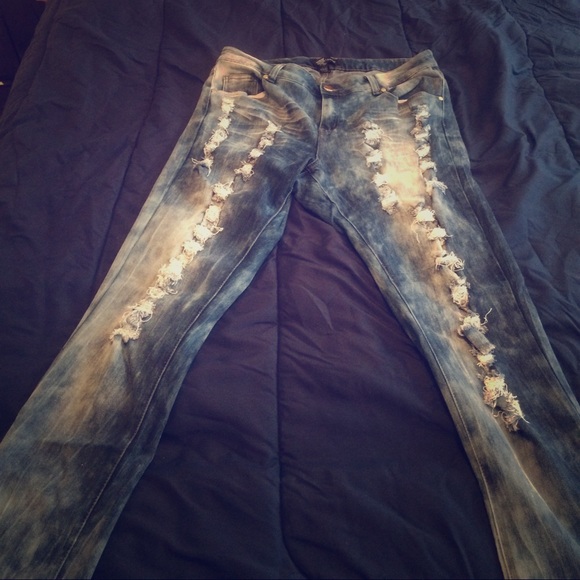 Destroyed (ripped) blue denim skinny