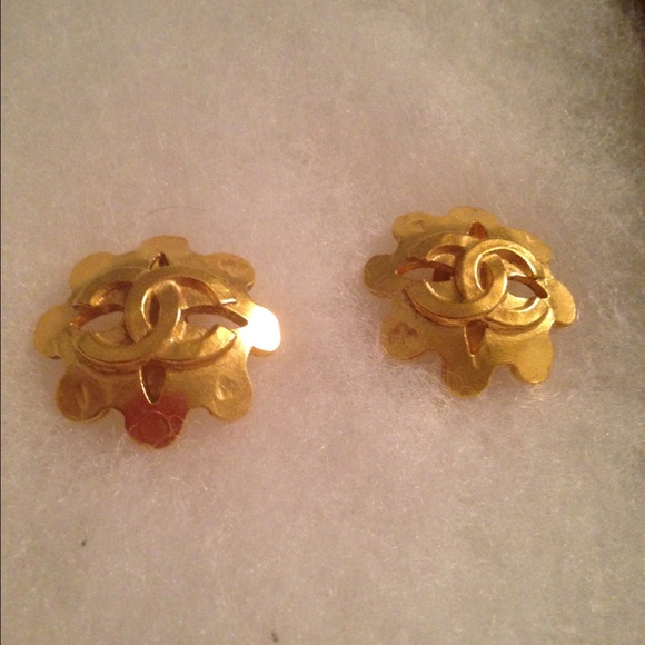 Goldtone earrings with Chanel logo