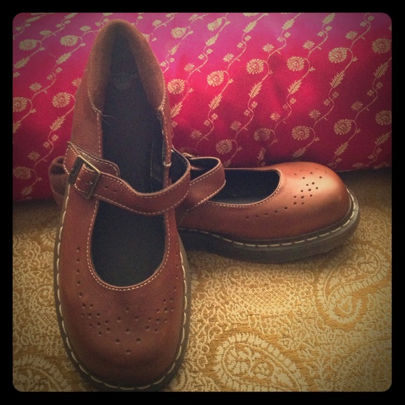Dr. Martens 11668 brown "Mary Jane" style shoes.