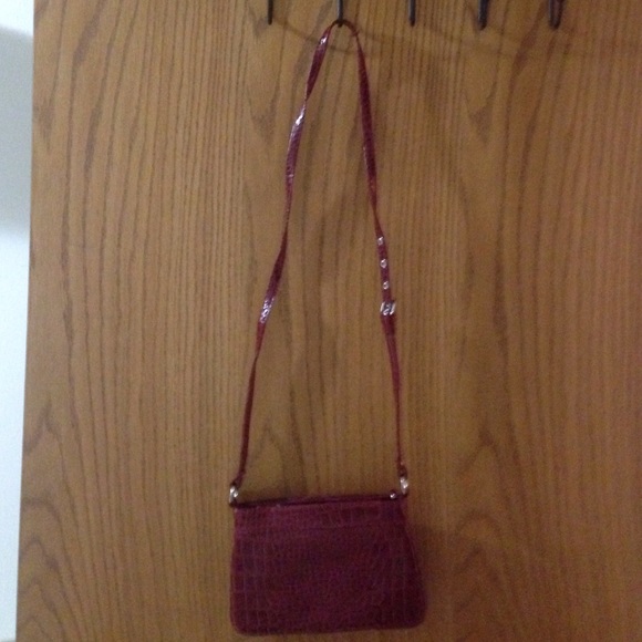 Red alligator looking print purse
