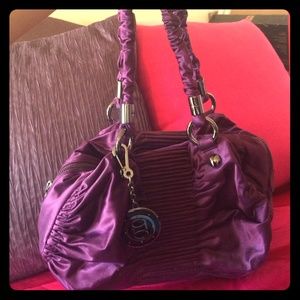 100% authentic Bebe purse. Absolutely 100% new!