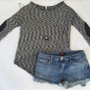 Black & white knit sweater with elbow patches