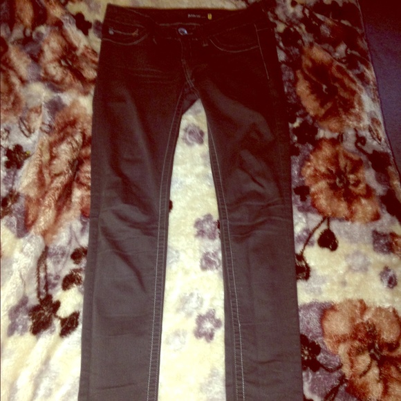 Dark grey skinny jeans . Light weight stecthy.