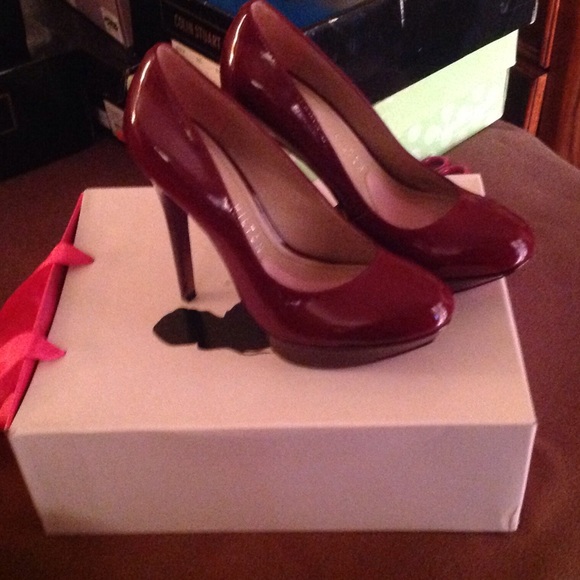 Paris Hilton burgundy platforms $30.00 size 5.5
