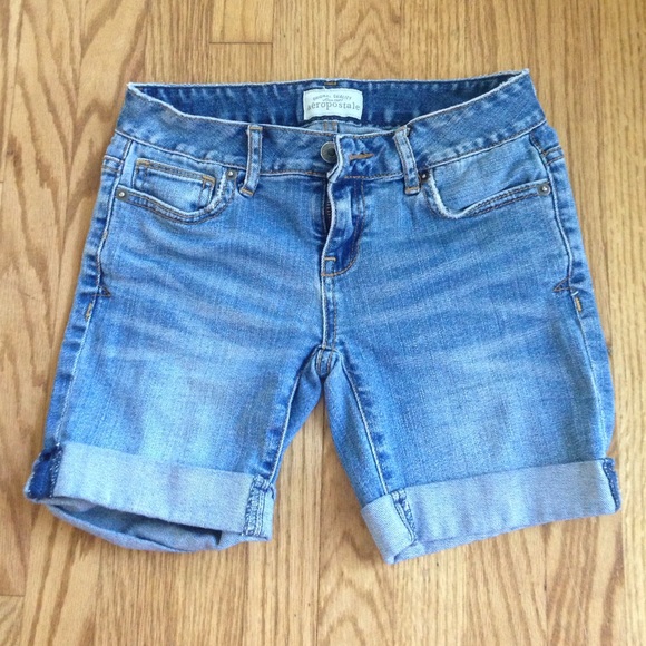 On hold: Mid length blue denim shorts