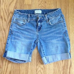 On hold: Mid length blue denim shorts