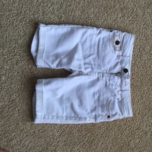 White slightly above knee shorts