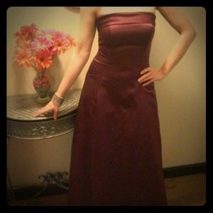 Strapless plum colored full length formal dress
