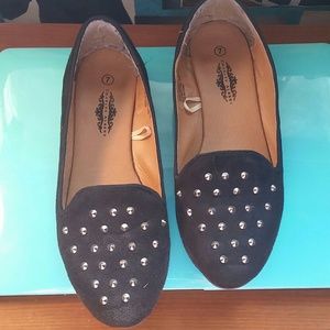 Black studded loafers