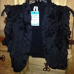 Black ruffle vest
